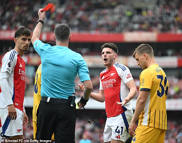 Declan Rice (middle right) was sent-off after a receiving a second yellow for a allegedly stopping Brighton's Joel Veltman from taking a quick-free quick in the 1-1 draw at the Emirates