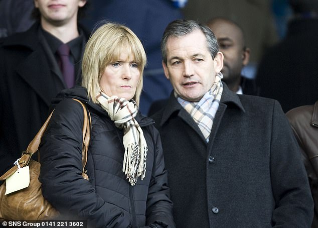 Burley, pictured alongside wife Jill in 2008, spoke about his treatment in a club statement