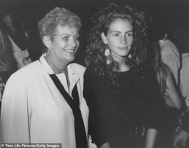 Julia pictured with their mother Betty Motes in 1989, who Eric claims was abusive during his childhood