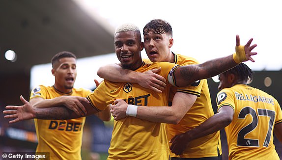 WOLVERHAMPTON, ENGLAND - SEPTEMBER 15: Mario Lemina of Wolverhampton Wanderers celebrates scoring his team's first goal with teammate Joergen Strand Larsen during the Premier League match between Wolverhampton Wanderers FC and Newcastle United FC at Molineux on September 15, 2024 in Wolverhampton, England. (Photo by Naomi Baker/Getty Images)