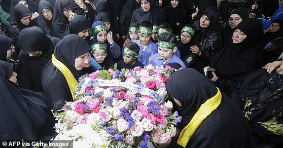 Relatives mourn Fatima Abdallah, a 10-year-old girl killed after hundreds of paging devices exploded in a deadly wave across Lebanon, during her funeral in the village of Saraain in the Bekaa valley on September 18, 2024. Hundreds of pagers used by Hezbollah members exploded across Lebanon Tuesday, killing at least nine people and wounding around 2,800 in blasts the Iran-backed militant group blamed on Israel. (Photo by AFP) (Photo by -/AFP via Getty Images)