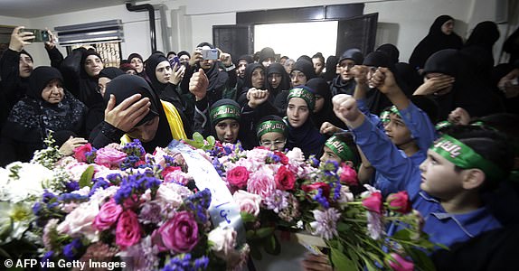 Relatives mourn Fatima Abdallah, a 10-year-old girl killed after hundreds of paging devices exploded in a deadly wave across Lebanon, during her funeral in the village of Saraain in the Bekaa valley on September 18, 2024. Hundreds of pagers used by Hezbollah members exploded across Lebanon Tuesday, killing at least nine people and wounding around 2,800 in blasts the Iran-backed militant group blamed on Israel. (Photo by AFP) (Photo by -/AFP via Getty Images)