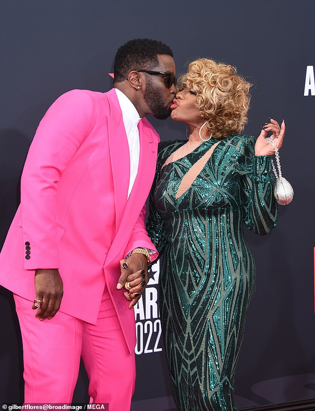 The pair are seen sharing a smooch again in June 2022, at the BET Awards red carpet