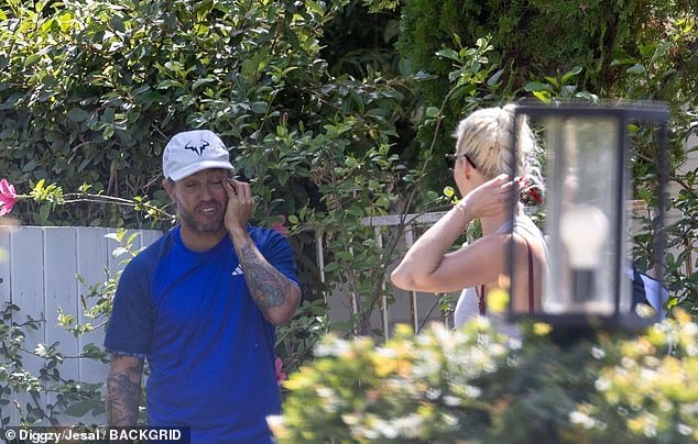 Crabb coaches celebrity clientele from Pete Wentz (pictured with Jordyn on Tuesday) to Hillary Duff and Zach Braff on his bright blue court