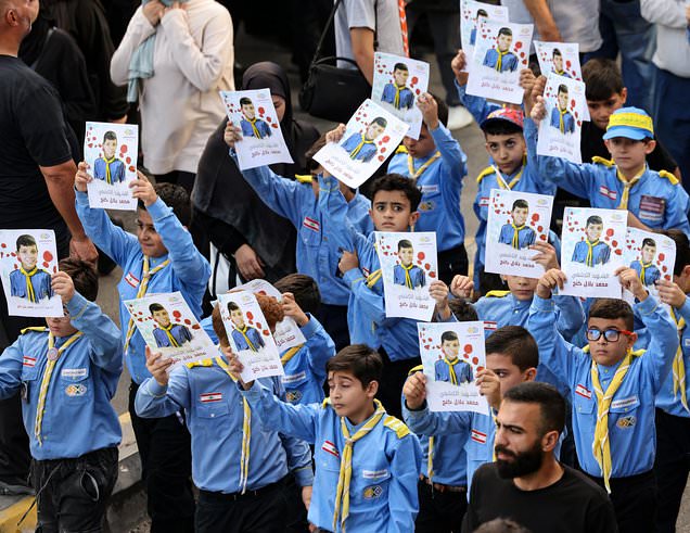 Lebanese scouts line the streets in grief for young boy killed in Hezbollah pager