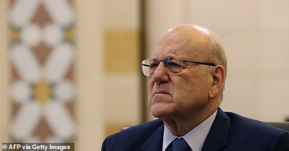 (FILES) A file picture shows Lebanon's Prime Minister Najib Mikati during an interview with AFP at his office in Beirut on October 30, 2023. The Lebanese premier called on September 19, 2024 for the United Nations to oppose Israel's "technological war" on his country ahead of a Security Council meeting on exploding devices used by Hezbollah that killed 32 people. Mikati said in a statement the UN Security Council's upcoming meeting should "take a firm stance to stop the Israeli aggression on Lebanon and the technological war it is waging". (Photo by JOSEPH EID / AFP) (Photo by JOSEPH EID/AFP via Getty Images)