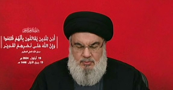 An image grab taken from Hezbollah's Al-Manar TV shows the Lebanese militant group's chief Hassan Nasrallah addressing the nation from an undisclosed location on September 19, 2024. Nasrallah said in his first televised appearance after this week's electronic devices' attacks in Lebanon that Israel had dealt an "unprecedented" blow to his group, crossing all red lines with device explosions that killed 37 people and wounded nearly 3,000 over two days. Israel has not commented on the attacks. (Photo by Al-Manar / AFP) / RESTRICTED TO EDITORIAL USE - MANDATORY CREDIT "AFP PHOTO / HO / AL-MANAR" - NO MARKETING NO ADVERTISING CAMPAIGNS - DISTRIBUTED AS A SERVICE TO CLIENTS (Photo by -/Al-Manar/AFP via Getty Images)