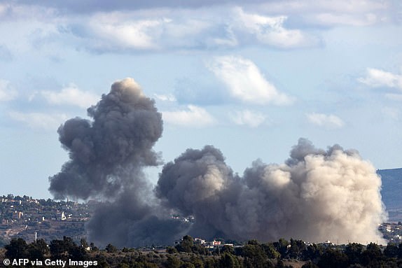 TOPSHOT - Smoke billows from the site of an Israeli strike that targeted the southern Lebanese border village of Adshit on September 19, 2024. (Photo by AMMAR AMMAR / AFP) (Photo by AMMAR AMMAR/AFP via Getty Images)