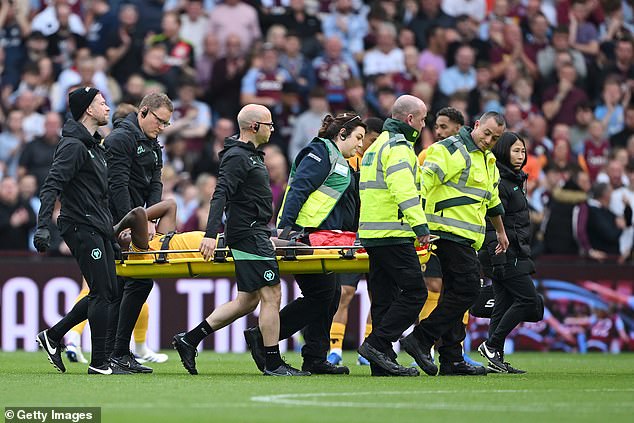 Wolves defender Yerson Mosquera was carried off on a stretcher in the second half