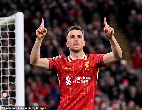 LIVERPOOL, ENGLAND - SEPTEMBER 25: (THE SUN OUT, THE SUN ON SUNDAY OUT) Diogo Jota of Liverpool celebrating after scoring the second goal during the Carabao Cup Third Round match between Liverpool and West Ham United at Anfield on September 25, 2024 in Liverpool, England. (Photo by Andrew Powell/Liverpool FC via Getty Images)