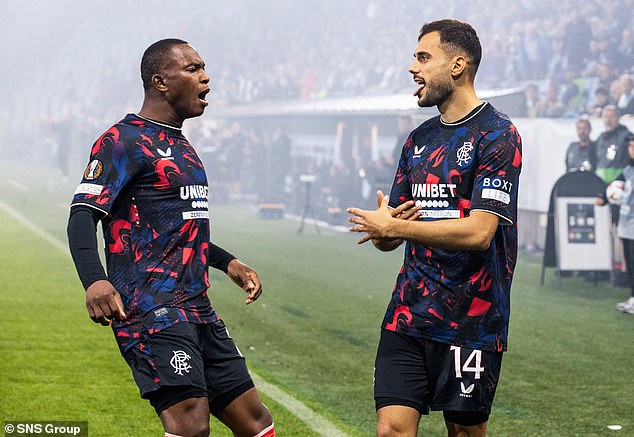 Bajrami (right) celebrates the opener with Kasanwirjo, who didn't put a foot wrong at left-back.