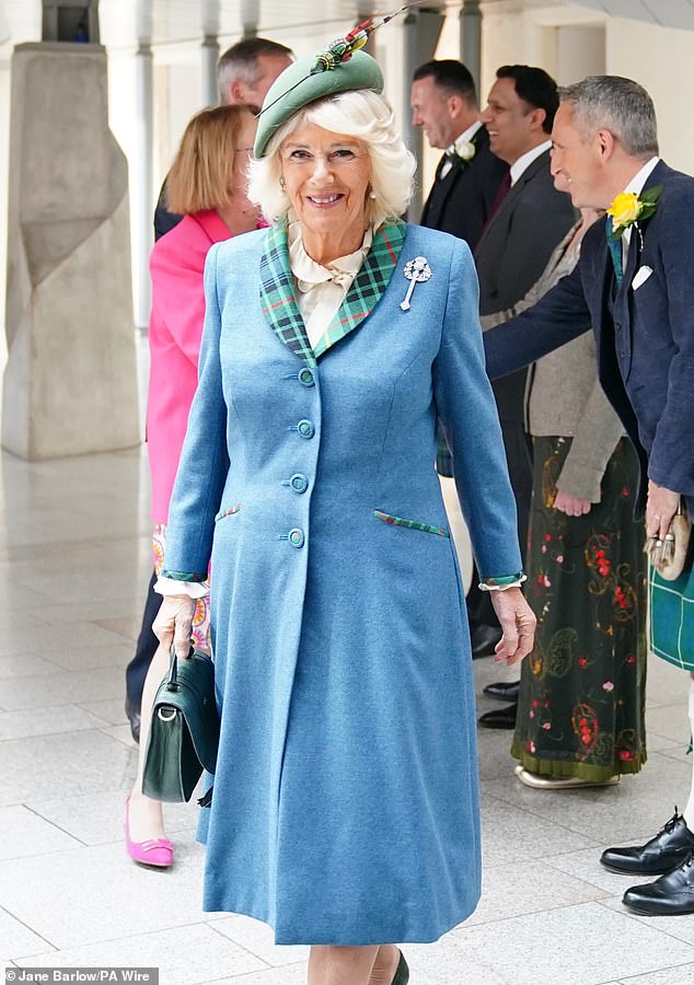 Queen Camilla paid homage to Scottish culture in Queen Mary's glittering brooch as she joined King Charles at the Scottish Parliament's 25th anniversary celebration today