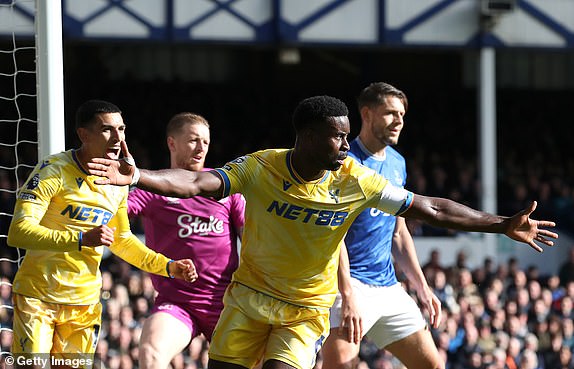 LIVERPOOL, ENGLAND - SEPTEMBER 28: Marc Guehi of Crystal Palace celebrates scoring his team's first goal during the Premier League match between Everton FC and Crystal Palace FC at Goodison Park on September 28, 2024 in Liverpool, England. (Photo by Jan Kruger/Getty Images)