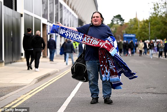 IPSWICH, ENGLAND - SEPTEMBER 29: Merchandise is seen for sale outside the stadium prior to the Premier League match between Ipswich Town FC and Aston Villa FC at Portman Road on September 29, 2024 in Ipswich, England. (Photo by Justin Setterfield/Getty Images)