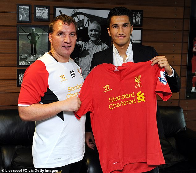 Rodgers unveils new arrival Sahin at Anfield after beating Arsenal to his signature in 2012