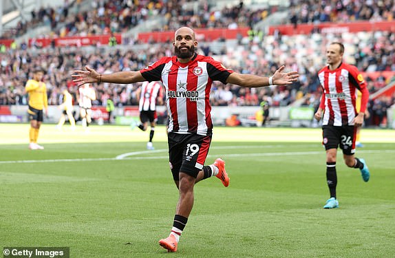 BRENTFORD, ENGLAND - OCTOBER 05: Bryan Mbeumo of Brentford celebrates scoring his team's second goal from the penalty spot during the Premier League match between Brentford FC and Wolverhampton Wanderers FC at Gtech Community Stadium on October 05, 2024 in Brentford, England. (Photo by Ryan Pierse/Getty Images)