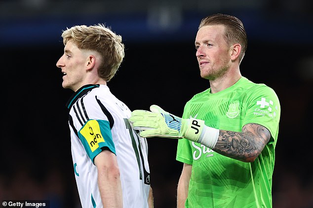 Pickford's penalty was saved by Everton and England goalkeeper Jordan Pickford (right)