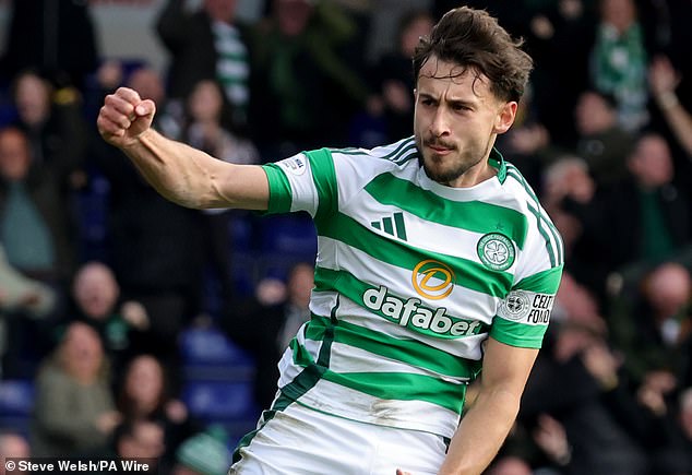 Kuhn celebrates his late goal which snatched vital points for Celtic