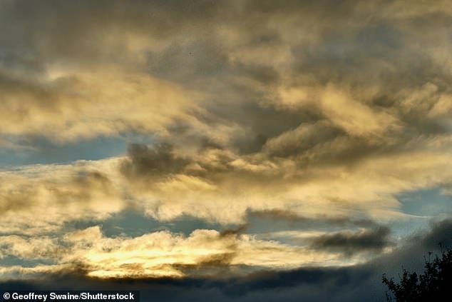 Clouds fill the sky during sunrise this morning in Dunsden, Oxfordshire