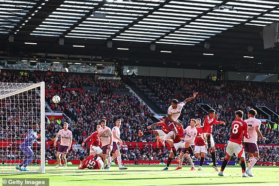 MANCHESTER, ENGLAND - OCTOBER 19: Ethan Pinnock of Brentford scores a goal to make it 0-1 during the Premier League match between Manchester United FC and Brentford FC at Old Trafford on October 19, 2024 in Manchester, England. (Photo by Robbie Jay Barratt - AMA/Getty Images)