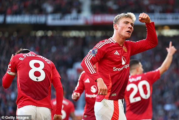 MANCHESTER, ENGLAND - OCTOBER 19: Rasmus HÃ¸jlund of Manchester United celebrates after scoring a goal to make it 2-1 during the Premier League match between Manchester United FC and Brentford FC at Old Trafford on October 19, 2024 in Manchester, England. (Photo by Robbie Jay Barratt - AMA/Getty Images)