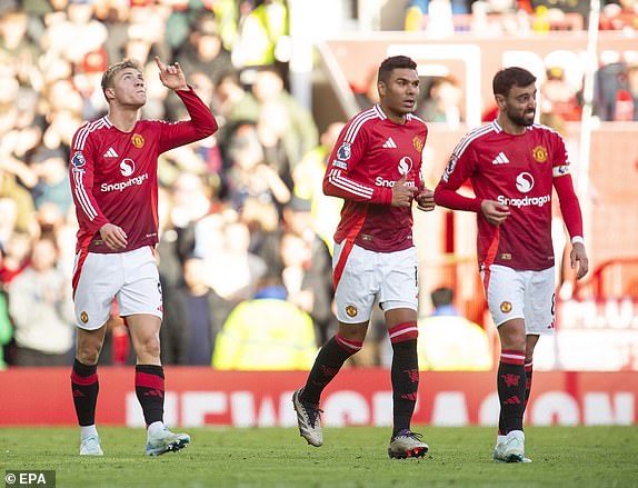 epa11668906 Rasmus Hojlund of Manchester United celebrates after scoring the third goal during the  English Premier League match between Manchester United and Brentford FC, in Manchester, Britain, 19 October 2024.  EPA/PETER POWELL EDITORIAL USE ONLY. No use with unauthorized audio, video, data, fixture lists, club/league logos, 'live' services or NFTs. Online in-match use limited to 120 images, no video emulation. No use in betting, games or single club/league/player publications.