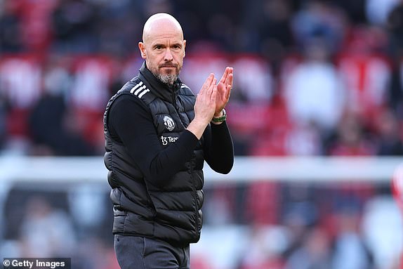 MANCHESTER, ENGLAND - OCTOBER 19: Erik ten Hag the head coach / manager of Manchester United applauds the fans at full time  during the Premier League match between Manchester United FC and Brentford FC at Old Trafford on October 19, 2024 in Manchester, England. (Photo by Robbie Jay Barratt - AMA/Getty Images)