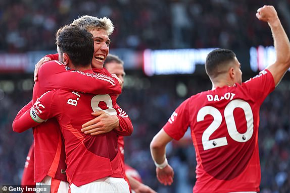 MANCHESTER, ENGLAND - OCTOBER 19: Rasmus HÃ¸jlund of Manchester United celebrates after scoring a goal to make it 2-1 during the Premier League match between Manchester United FC and Brentford FC at Old Trafford on October 19, 2024 in Manchester, England. (Photo by Robbie Jay Barratt - AMA/Getty Images)