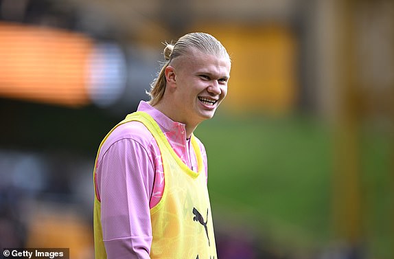 WOLVERHAMPTON, ENGLAND - OCTOBER 20: Erling Haaland of Manchester City reacts as he warms up prior to the Premier League match between Wolverhampton Wanderers FC and Manchester City FC at Molineux on October 20, 2024 in Wolverhampton, England. (Photo by Shaun Botterill/Getty Images)