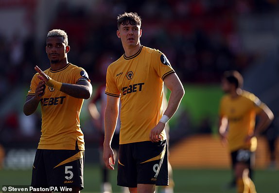 Wolverhampton Wanderers' Mario Lemina and Jorgen Strand Larsen (right) after the Premier League match at the Gtech Community Stadium, London. Picture date: Saturday October 5, 2024. PA Photo. See PA story SOCCER Brentford. Photo credit should read: Steven Paston/PA Wire.RESTRICTIONS: EDITORIAL USE ONLY No use with unauthorised audio, video, data, fixture lists, club/league logos or "live" services. Online in-match use limited to 120 images, no video emulation. No use in betting, games or single club/league/player publications.