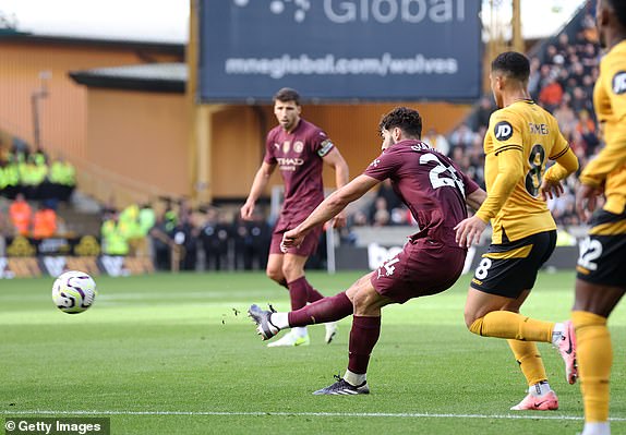 WOLVERHAMPTON, ENGLAND - OCTOBER 20: Josko Gvardiol of Manchester City scores their first goal during the Premier League match between Wolverhampton Wanderers FC and Manchester City FC at Molineux on October 20, 2024 in Wolverhampton, England. (Photo by Alex Livesey - Danehouse/Getty Images)