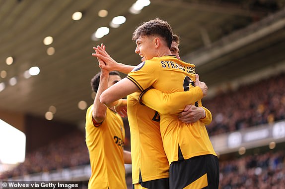 WOLVERHAMPTON, ENGLAND - OCTOBER 20: Joergen Strand Larsen of Wolverhampton Wanderers celebrates scoring his team's first goal with teammates during the Premier League match between Wolverhampton Wanderers FC and Manchester City FC at Molineux on October 20, 2024 in Wolverhampton, England. (Photo by Jack Thomas - WWFC/Wolves via Getty Images)