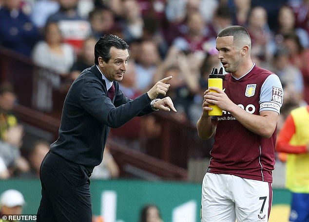 Villa captain John McGinn (right) has heaped praise on manager Unai Emery (left)