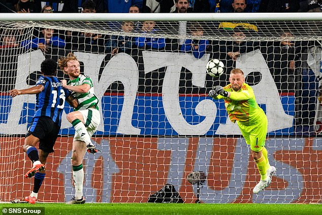 Kasper Schmeichel helped Celtic earn a draw that lifts their hopes of reaching the playoff round