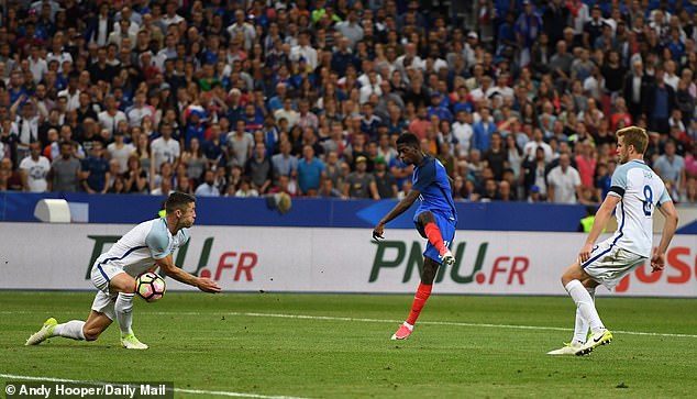 Ousmane Dembele (centre) pictured scoring a goal for France against England in June 2017