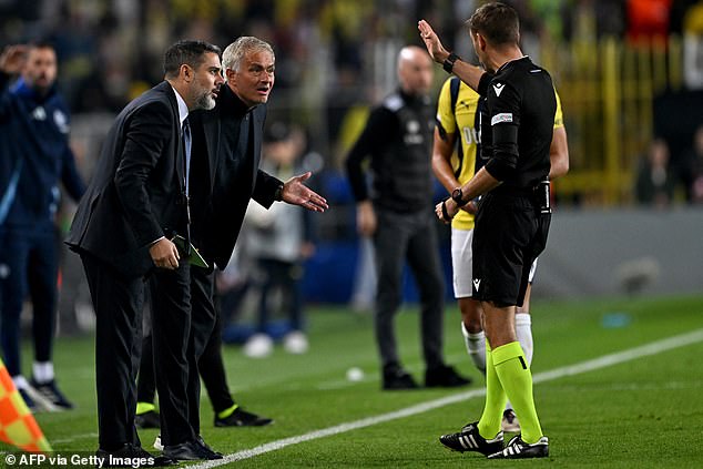 Mourinho was sent off by referee Clement Turpin (right) after complaining about a decision