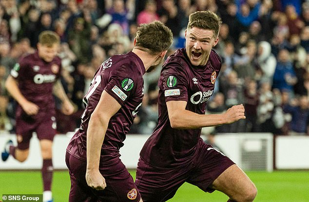 Blair Spittal, right, celebrates with  fellow goalscorer Alan Forrest