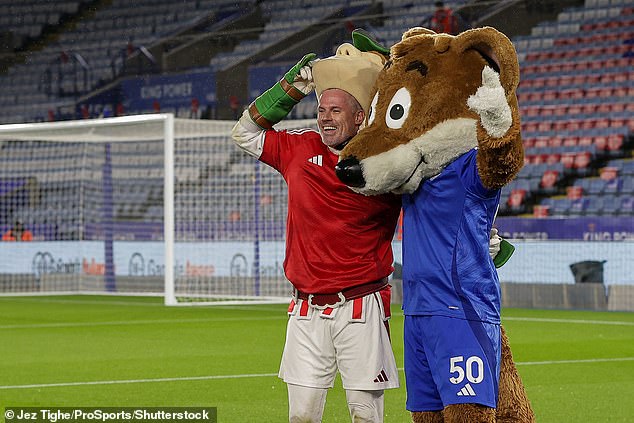 Jamie Carragher suited up as Nottingham Forest mascot 'Robin Hood' on Friday night