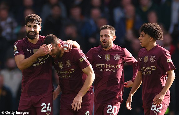 WOLVERHAMPTON, ENGLAND - OCTOBER 20: Josko Gvardiol of Manchester City celebrates with Mateo Kovacic, Bernardo Silva and Rico Lewis of Manchester City during the Premier League match between Wolverhampton Wanderers FC and Manchester City FC at Molineux on October 20, 2024 in Wolverhampton, England. (Photo by Marc Atkins/Getty Images)