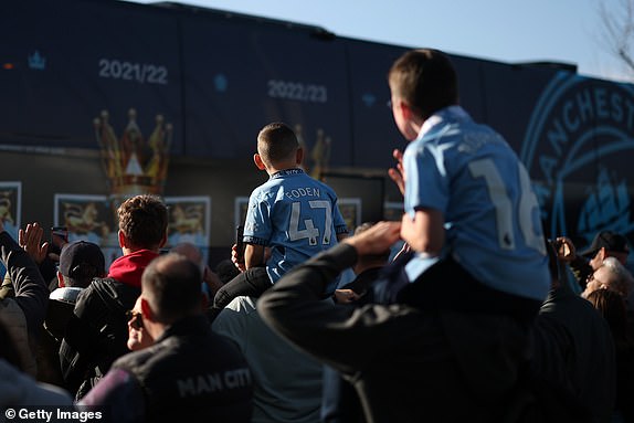 MANCHESTER, ENGLAND - OCTOBER 26: A young fan of Manchester City shows their support outside the stadium prior to the Premier League match between Manchester City FC and Southampton FC at Etihad Stadium on October 26, 2024 in Manchester, England. (Photo by Carl Recine/Getty Images)