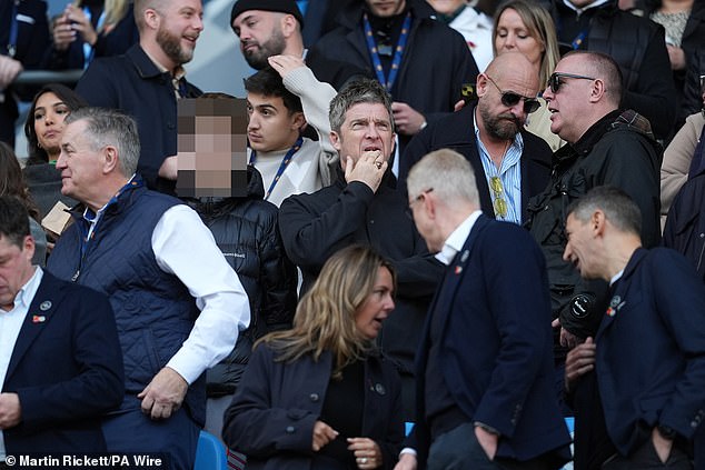 He was joined by his 17-year-old son, who was spotted in the stands intensely watching the game with his father