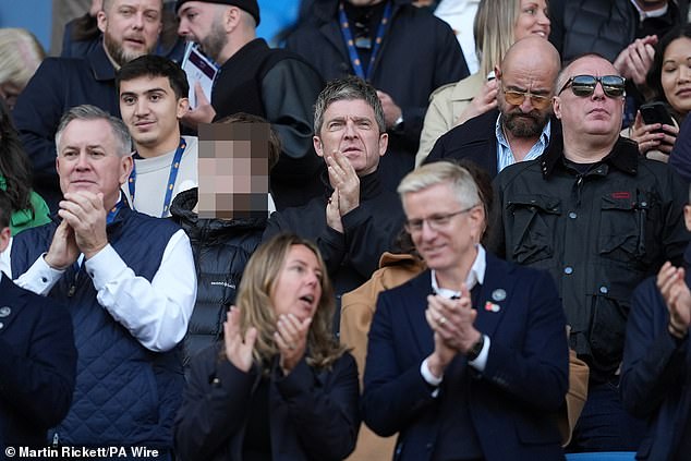 Noel was wearing a black buttoned up jacket as he watched his club go head to head with The Saints and continue their bid to stay at the top of the table