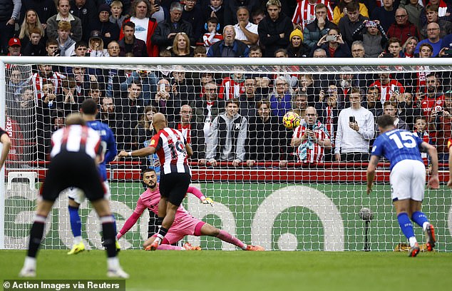 Mbeumo scored from the penalty spot to put Brentford ahead following Clarke's foul