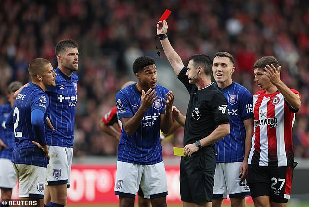 Clarke, left, saw his nightmare Premier League debut come to an end when he was sent off