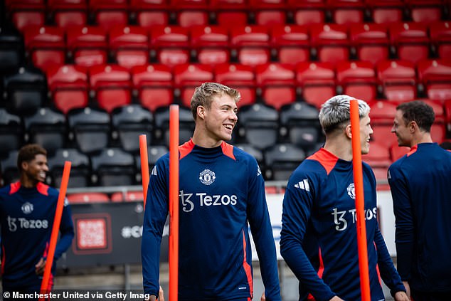 Hojlund pictured (centre) on Saturday during a first-team training session in east London