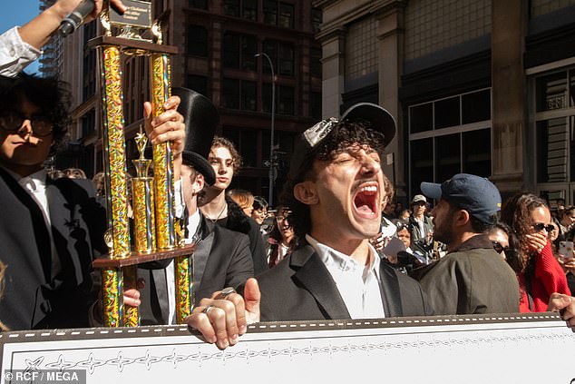 Competitors at the Manhattan event on Sunday told DailyMail.com the Wonka star arrived unexpectedly - triggering 'insane' scenes. (Pictured: Competitors at the doppelganger event)