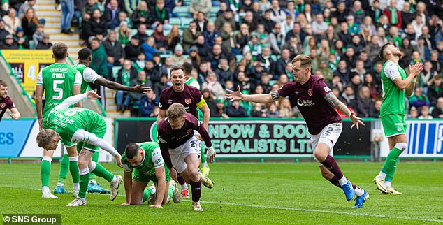 Hearts' James Wilson races off to celebrate after scoring a late equaliser in the 1-1 draw with Hibs