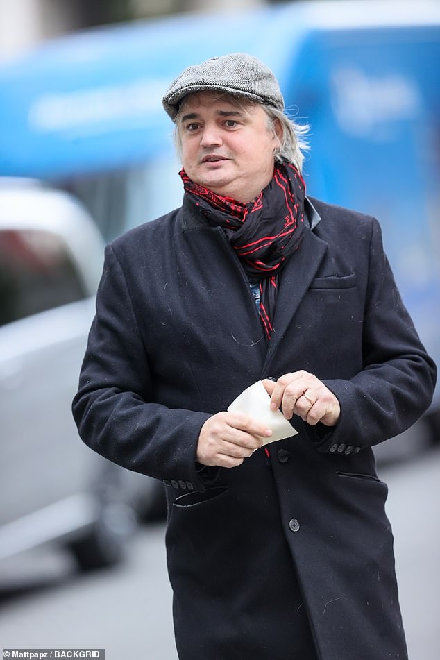 Pete Doherty seemed to be in high spirits as he showcased his trimmer frame and signed autographs for fans outside of BBC Studios in London on Wednesday