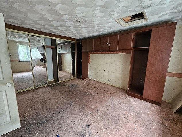 One of the upstair bedrooms includes a floor-to-ceiling smashed wardrobe