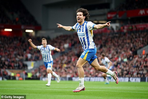 LIVERPOOL, ENGLAND - NOVEMBER 02: Ferdi Kadioglu of Brighton & Hove Albion celebrates scoring his team's first goal during the Premier League match between Liverpool FC and Brighton & Hove Albion FC at Anfield on November 02, 2024 in Liverpool, England. (Photo by Jan Kruger/Getty Images)